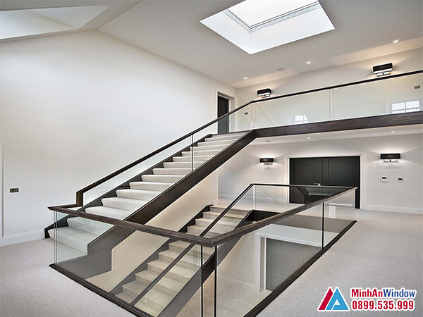 Lan can cầu thang kính tay vịn gỗ đẹp đơn giản - minh an window đã thi công Lan can cầu thang kính tay vịn gỗ đẹp đơn giản - Minh An Window đã thi công