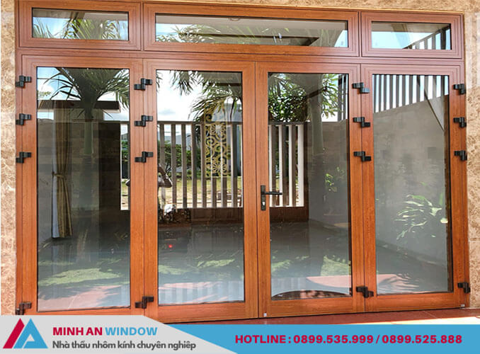 Phụ kiện cửa nhôm Xingfa - Minh An Window lắp đặt cho cửa mở quay 4 cánh màu vân gỗ
