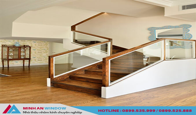 Mẫu cầu thang kính tay vịn gỗ vuông đơn giản nhưng sang trọng - Minh An Window cung cấp và lắp đặt Mẫu cầu thang kính tay vịn gỗ vuông đơn giản nhưng sang trọng - Minh An Window cung cấp và lắp đặt